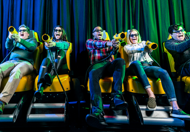 Group of adults on the XD Dark ride screaming